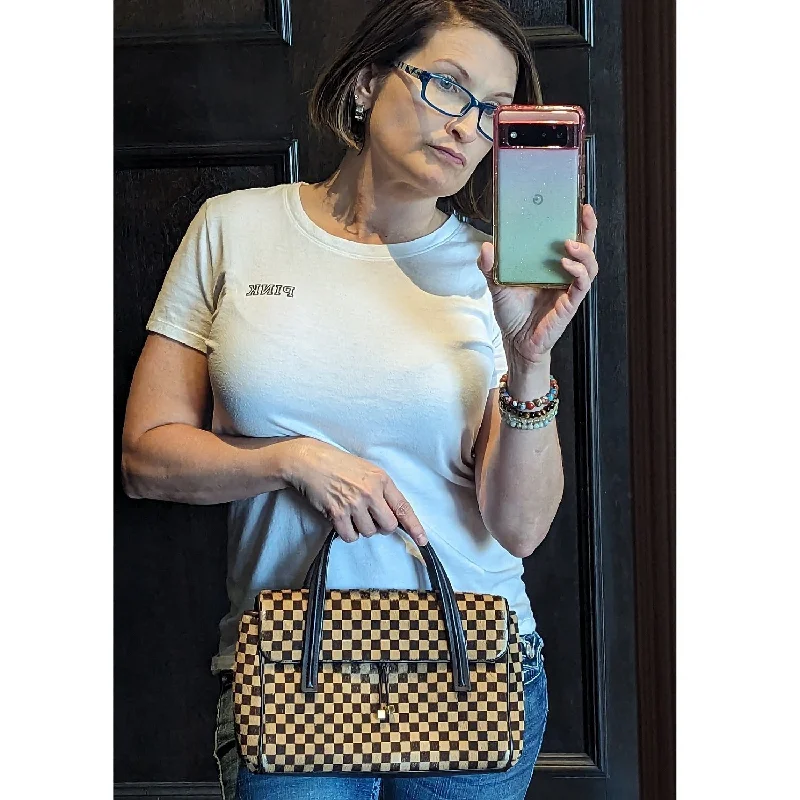 Louis Vuitton Damier Sauvage Lionne Handbag